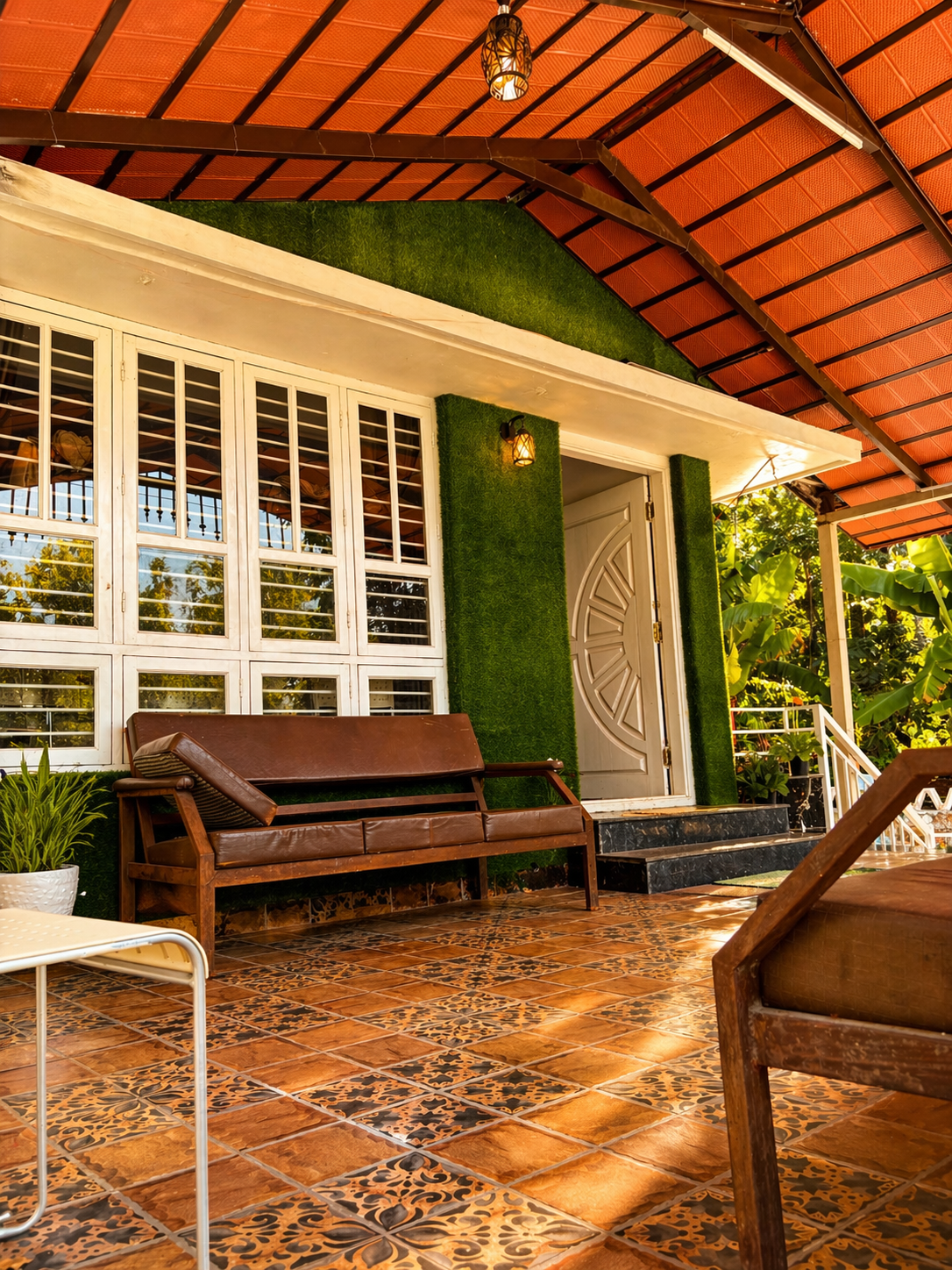 Patio seating with greenery